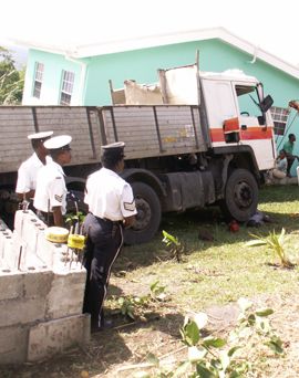 Driver crushed to death by truck