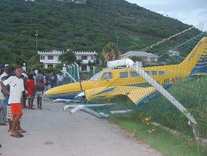 SVG Air aircraft with six on board crashes into fence at Union Island