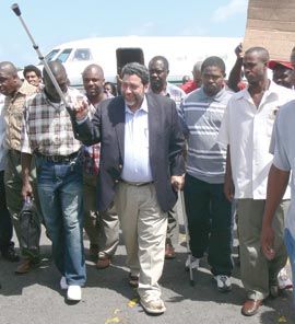 Prime Minister Dr. Gonsalves returns on crutches