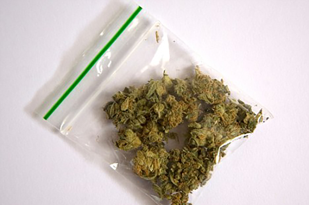 Woman arrested after carrying weed into a police station