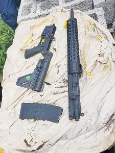 Vincentian, Grenadian held with AR-15, bullets