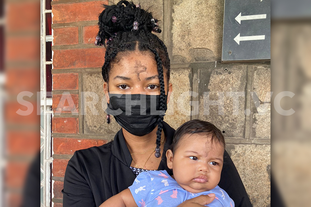 Mother and Daughter  observe Ash Wednesday