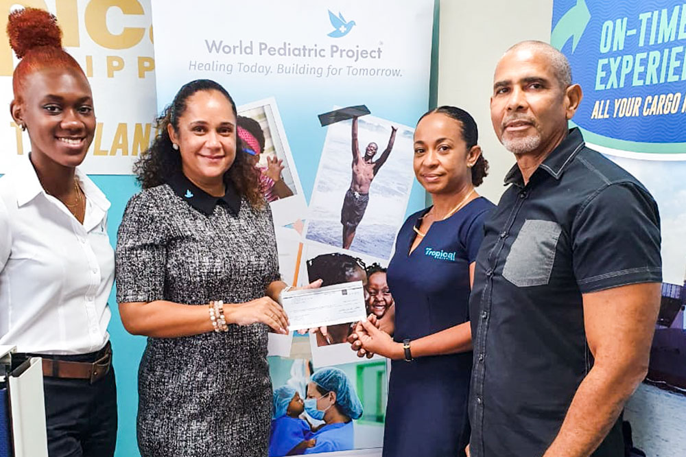 Tropical Shipping makes donation to World Paediatric Project