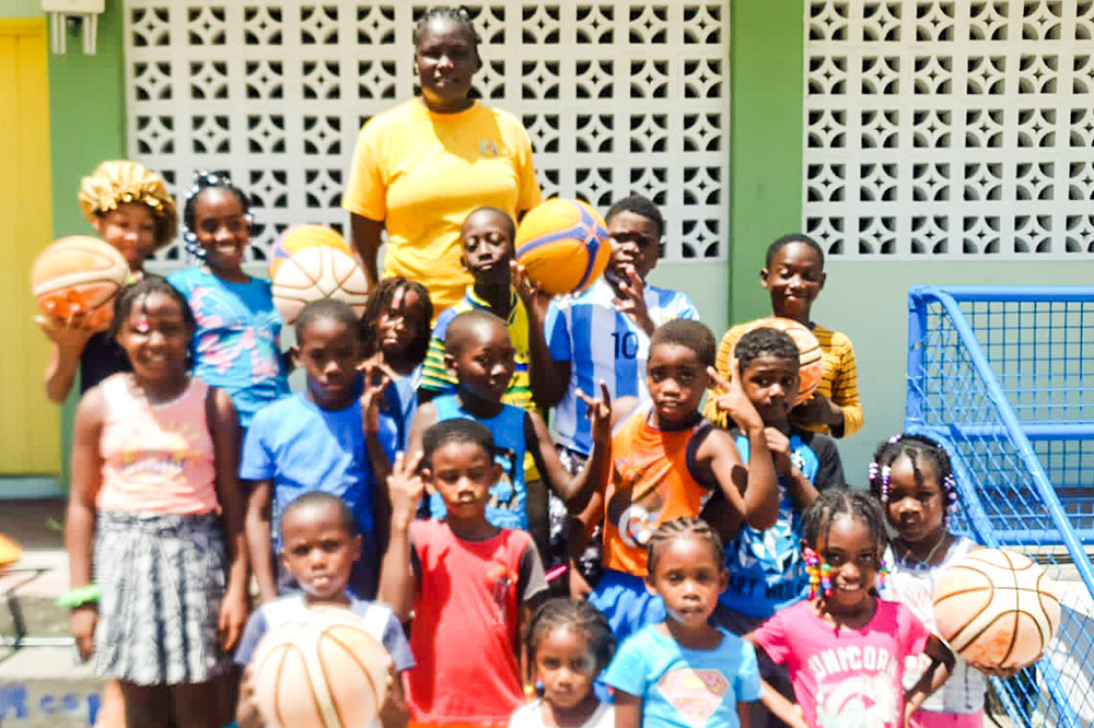 Veteran netballer passes on skills at summer camp